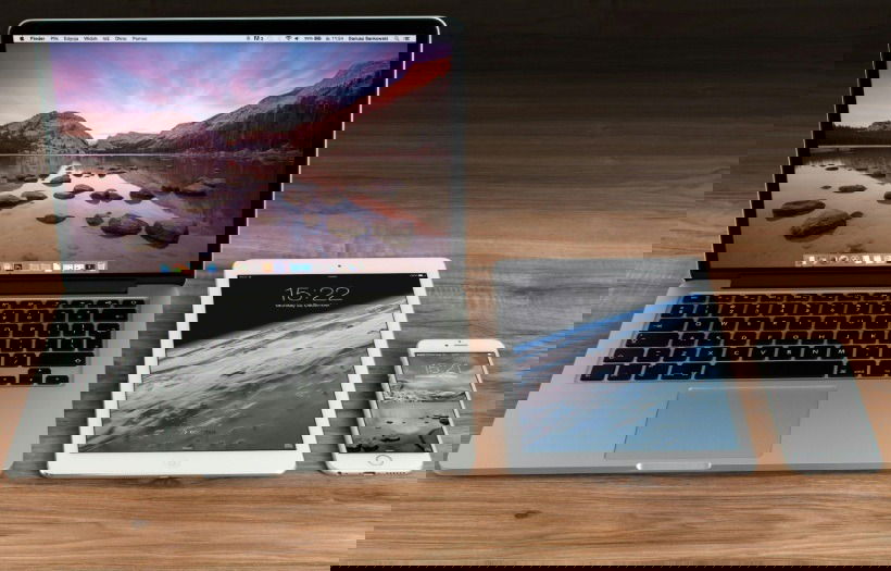 MacBook, iPad et iPhone côte à côte.