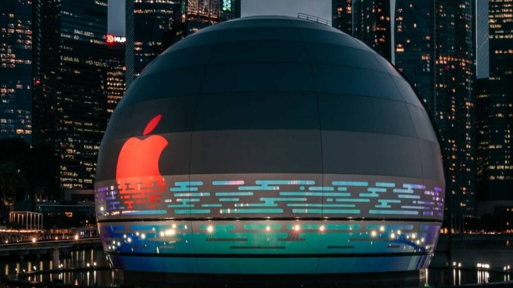 Apple logo on sphere.