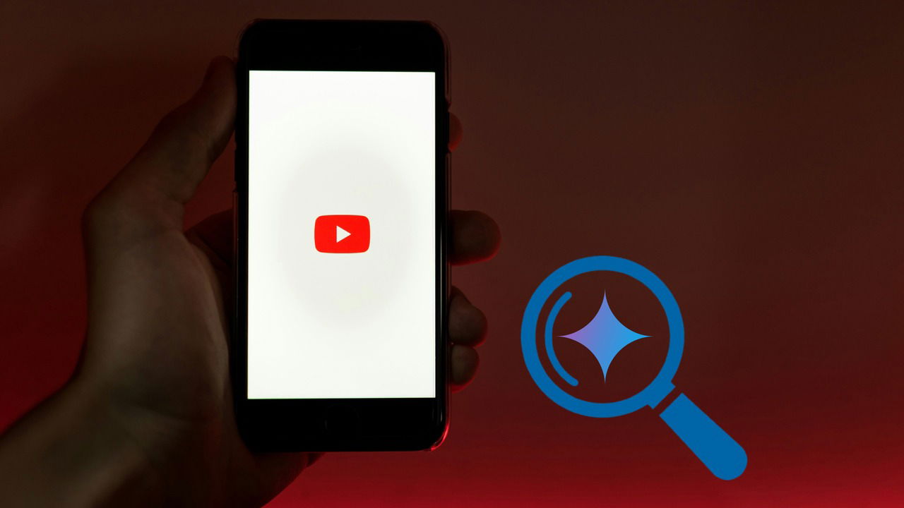 hand holding a phone with YouTube icon in middle and search icon on right