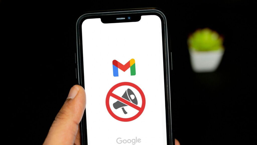 phone in hand with gmail icon and no ads icon in middle