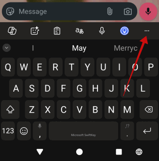 Appuyez sur l'icône à trois points sur l'application ShiftKey lors de l'utilisation de WhatsApp.