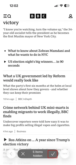 Appuyez sur le bouton coche pour masquer tous les éléments sur Safari sur iPhone. 