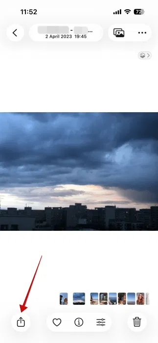 Partager une photo depuis l'application Photos sur iPhone.