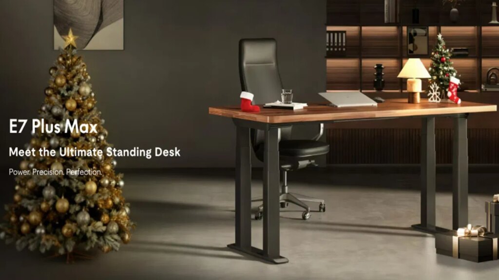 FlexiSpot E7 Plus Max Standing Desk in a Christmas office.