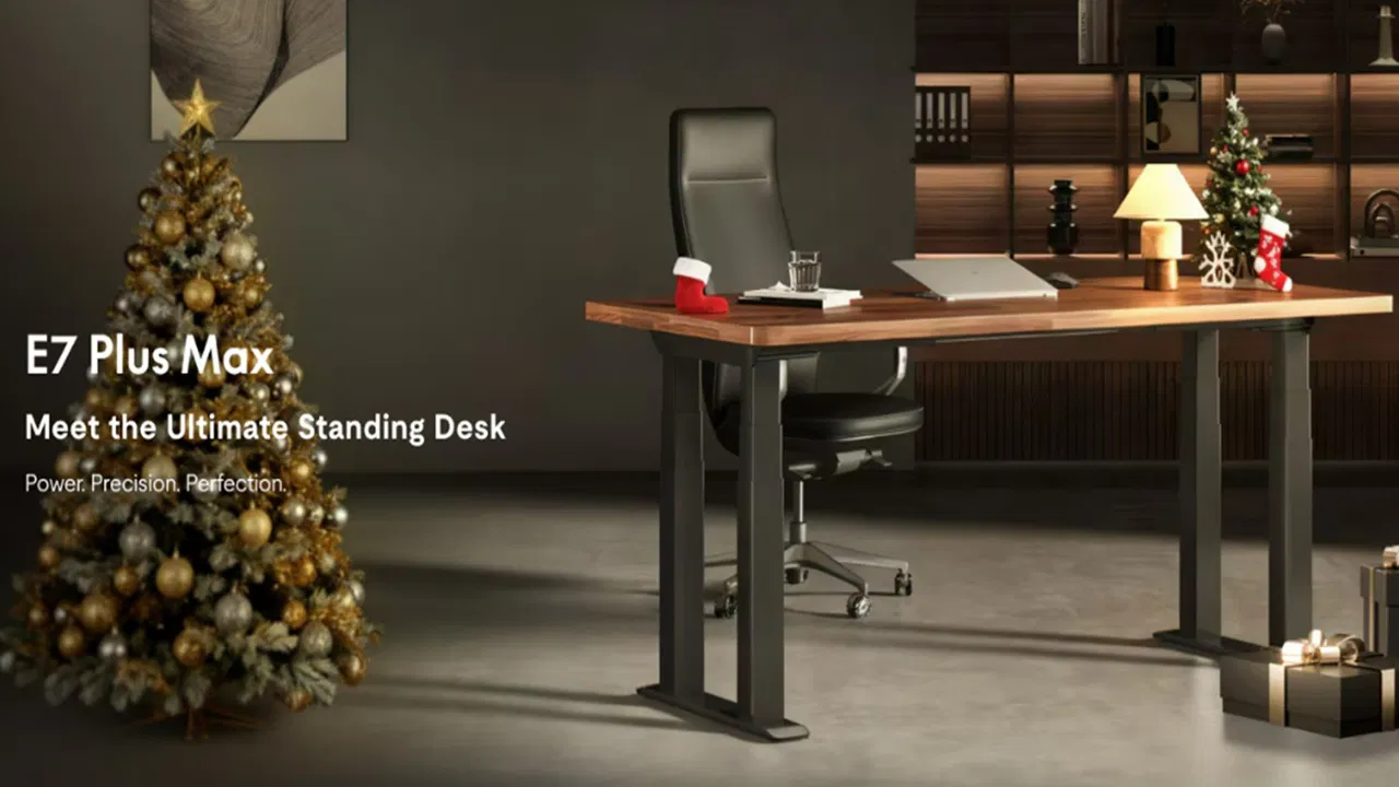 FlexiSpot E7 Plus Max Standing Desk in a Christmas office.