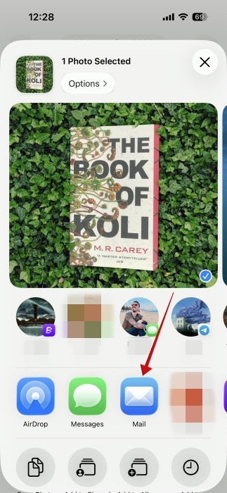 Partage d'une image HEIC vers l'application Mail pour la conversion sur iPhone.