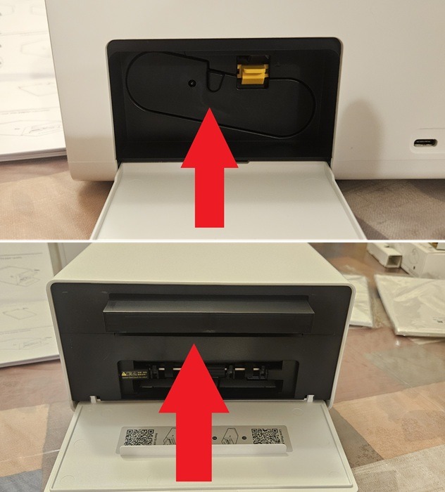 Chargement de l'encre et stockage de la cartouche de papier.
