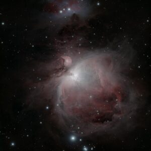 Stunning capture of the Orion Nebula (M42) with sparkling stars and vibrant emission clouds.