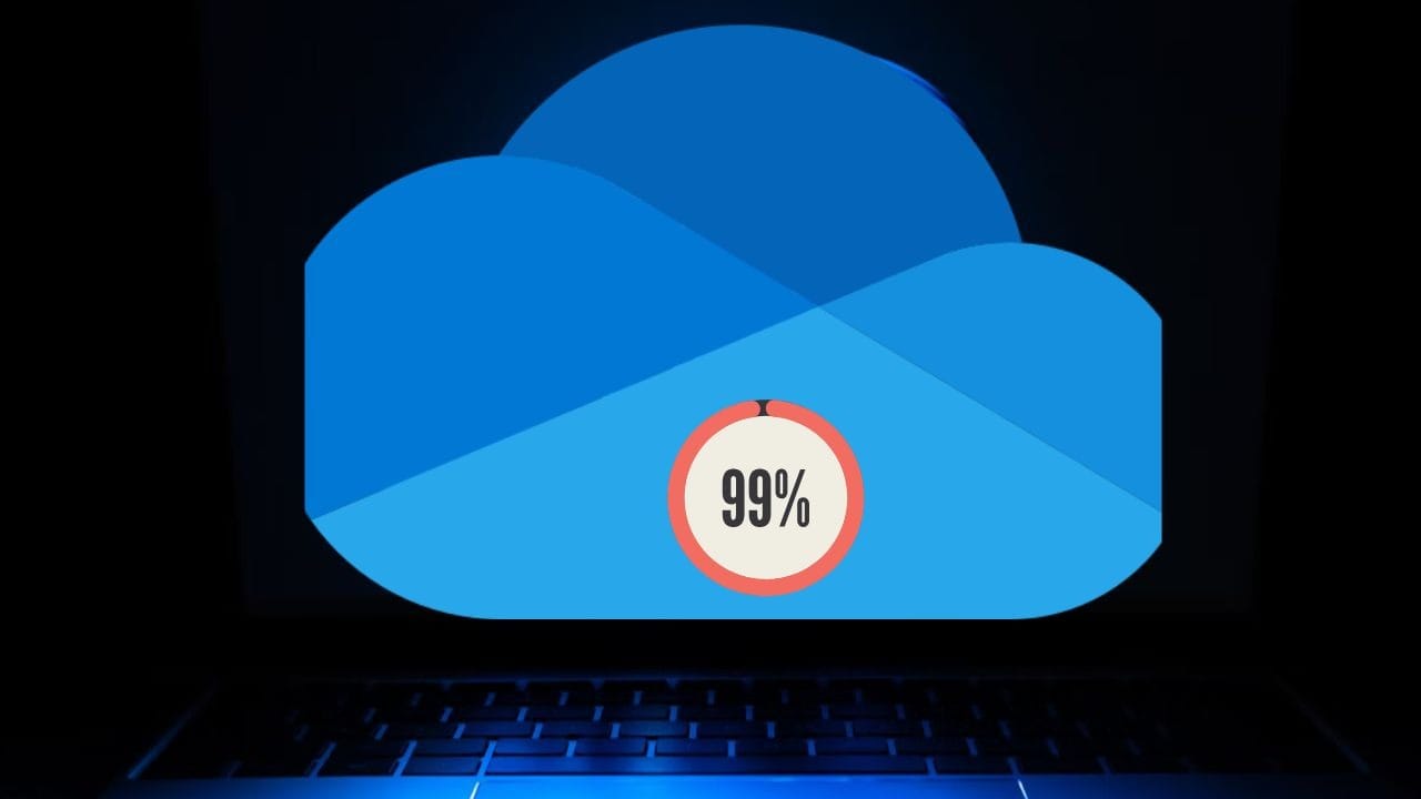 A 99% display over the OneDrive logo on a PC screen.